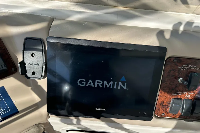 Slide: The Image of Garmin navigation system on 2001 Sea Ray 540 Sundancer yacht dashboard. - 37
