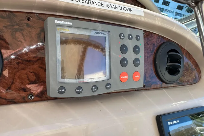 Slide: The Image of Raytheon autopilot system on 2001 Sea Ray 540 Sundancer yacht dashboard. - 39