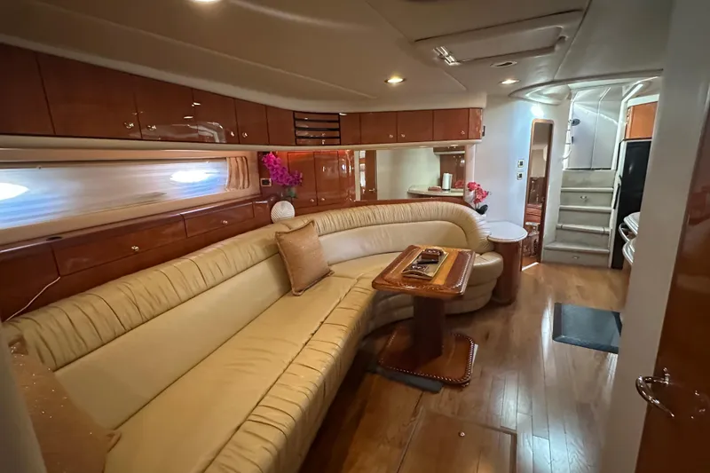 Slide: The Image of Luxurious interior of 2001 Sea Ray 540 Sundancer yacht with elegant seating and wood finishes. - 5