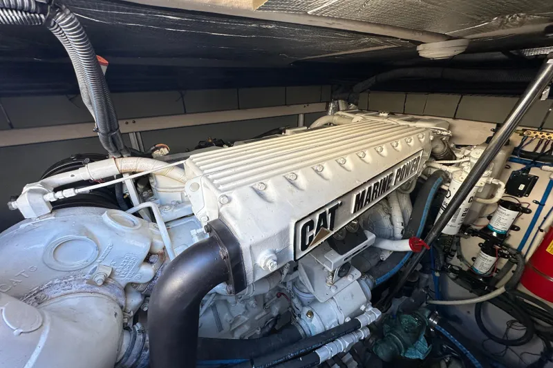 Slide: The Image of Engine room of 2001 Sea Ray 540 Sundancer with CAT Marine Power engine. - 54