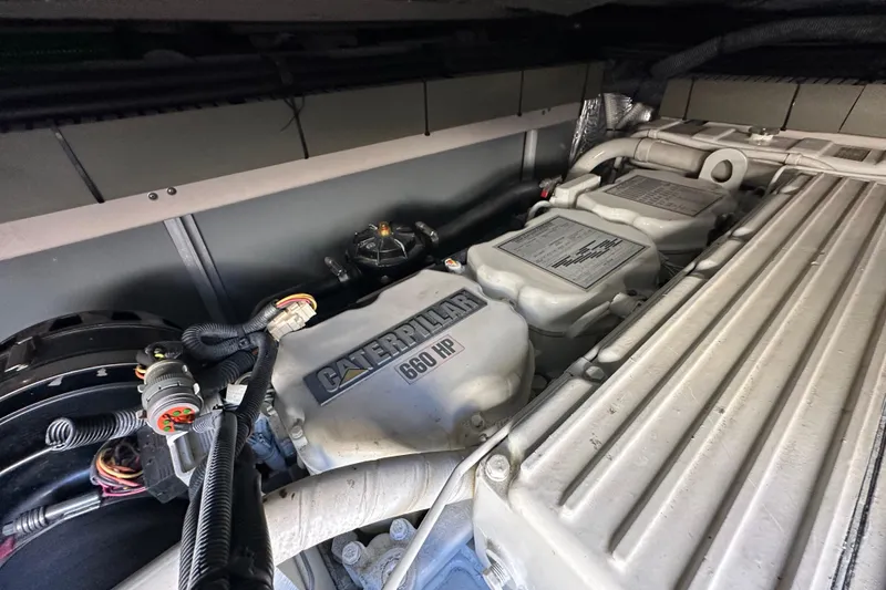 Slide: The Image of Engine compartment of a 2001 Sea Ray 540 Sundancer with Caterpillar 660 HP engine. - 55