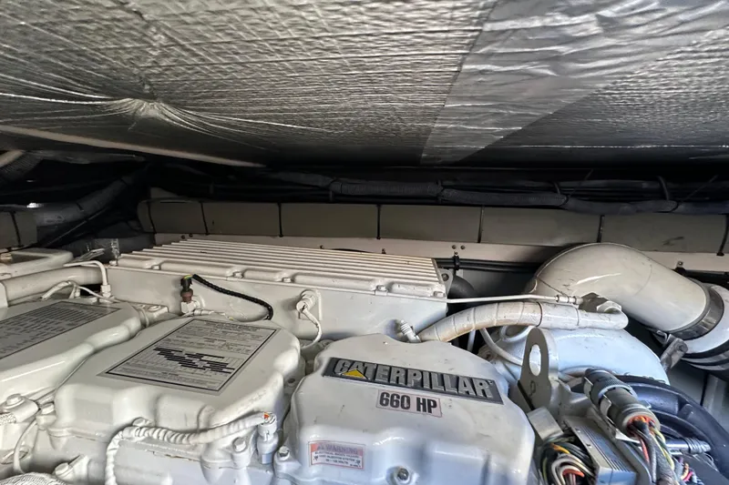 Slide: The Image of Engine room of 2001 Sea Ray 540 Sundancer with Caterpillar 660 HP engine. - 60