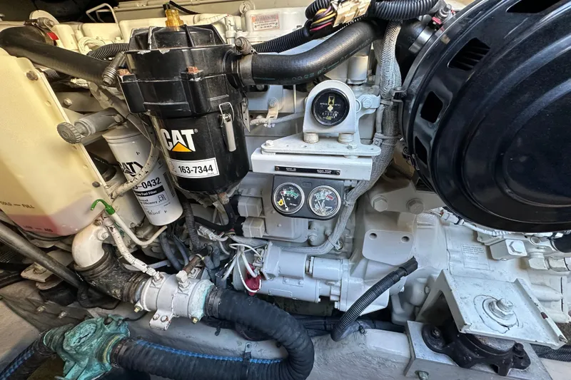 Slide: The Image of Engine compartment of a 2001 Sea Ray 540 Sundancer with CAT components and gauges. - 65