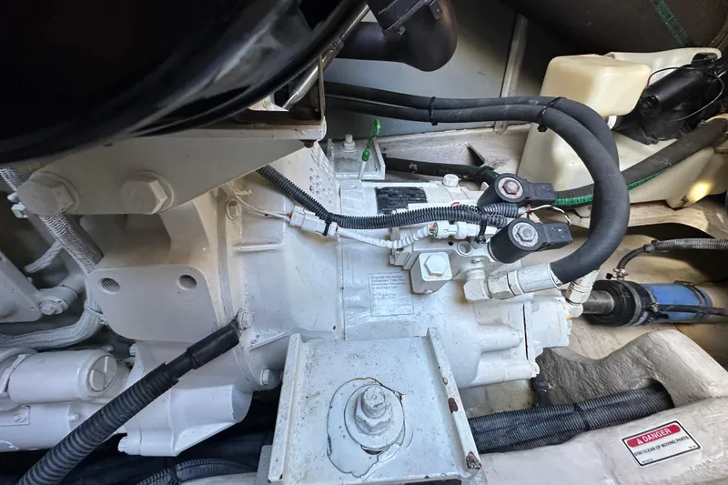 Slide: The Image of Engine compartment of a 2001 Sea Ray 540 Sundancer boat, showing mechanical components. - 67