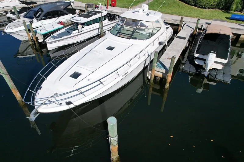 Slide: The Image of 2001 Sea Ray 540 Sundancer yacht docked at marina, aerial view. - 77