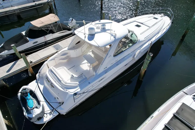 Slide: The Image of 2001 Sea Ray 540 Sundancer yacht docked in marina, aerial view. - 78