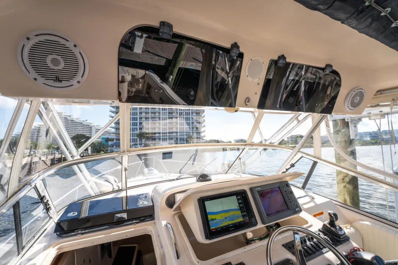 Slide: The Image of Interior view of 2005 Grady-White Express 330 boat with navigation equipment. - 18