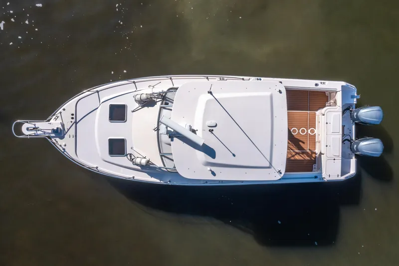 Slide: The Image of Top view of a 2005 Grady-White Express 330 boat with twin engines. - 5