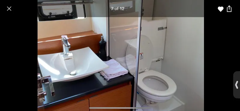 Slide: The Image of Modern bathroom in 2016 Prestige 450 S yacht with sink and toilet. - 12