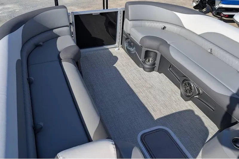 Slide: The Image of 2025 Avalon 2385 LSZ Cruise interior with gray seating and carpeted flooring. - 20