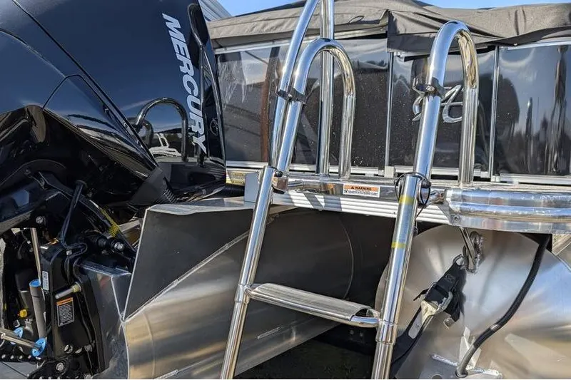 Slide: The Image of 2025 Avalon 2385 LSZ CRUISE boat with Mercury engine and stainless steel ladder. - 4