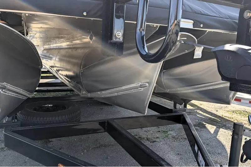 Slide: The Image of 2025 Avalon 2385 LSZ CRUISE pontoon boat on a trailer, close-up view. - 9