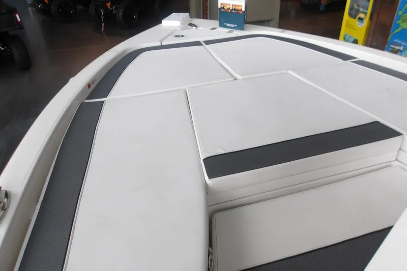 Slide: The Image of 2026 Ranger 2510 Bay boat deck with cushioned seating and sleek design. - 17