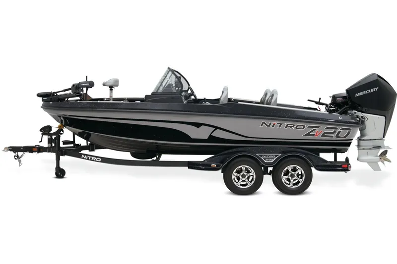 Slide: The Image of 2026 Nitro ZV20 Pro boat on trailer, parked on grass, with powerful outboard motor. - 1