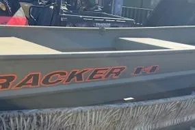The Image of 2026 Tracker Grizzly 14 Jon boat with camouflage design, side view. - 0