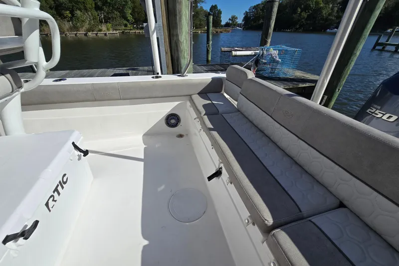 Slide: The Image of 2022 Sea Fox 249 Avenger boat interior with seating and RTIC cooler. - 24
