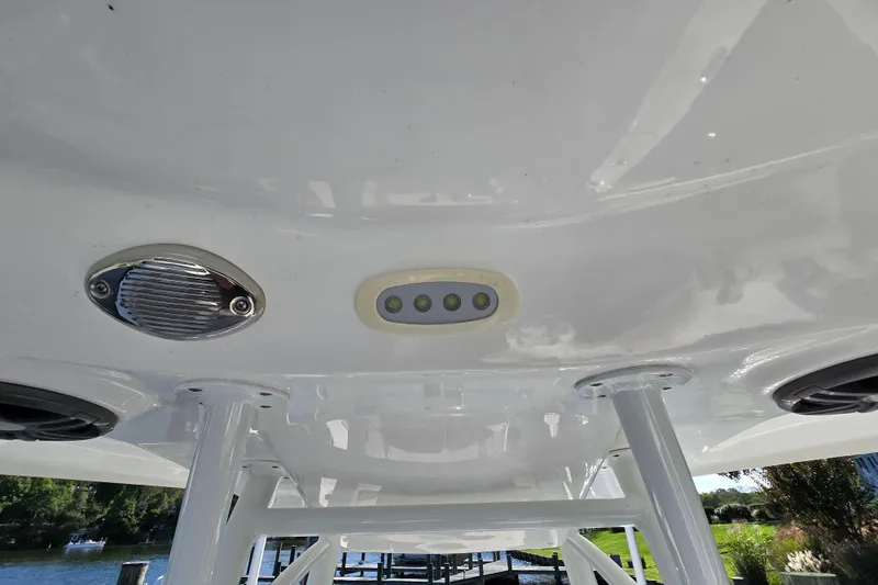 Slide: The Image of 2022 Sea Fox 249 Avenger boat ceiling with lights and speakers. - 40