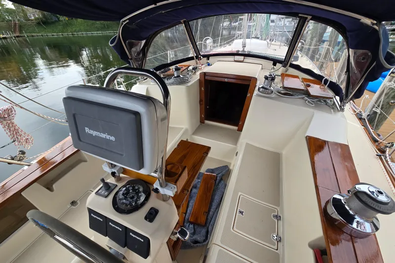 Slide: The Image of Cockpit view of 2001 Island Packet 420 sailboat with lifesaving equipment. - 21