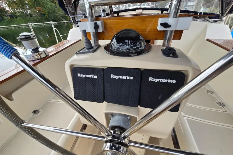 Slide: The Image of Cockpit of 2001 Island Packet 420 sailboat with Raymarine navigation system. - 22