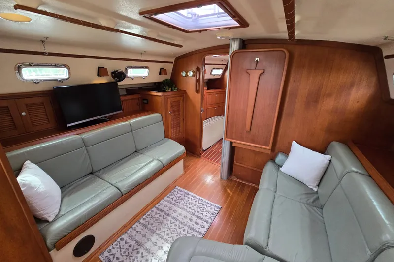 Slide: The Image of Luxurious interior of 2001 Island Packet 420 yacht with leather seating and wooden finishes. - 49