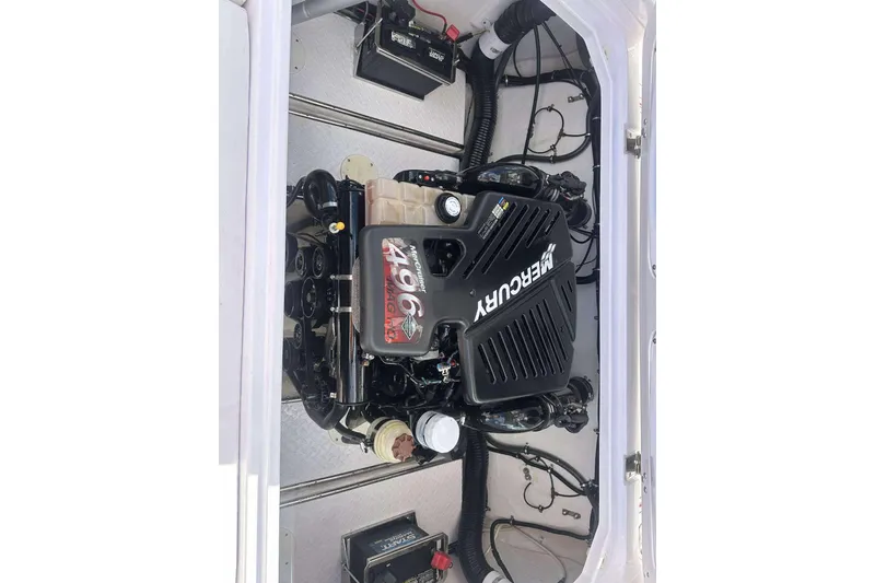Slide: The Image of Engine compartment of a 2006 Donzi 26 boat with a Mercury 496 engine. - 10