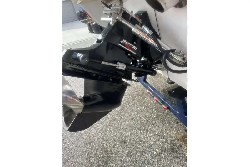 Slide: The Image of 2006 Donzi 26 boat with Mercury outboard motor detail. - 11