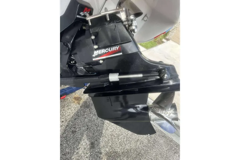 Slide: The Image of Mercury outboard motor on 2006 Donzi 26 boat, featuring Bravo One propeller. - 7
