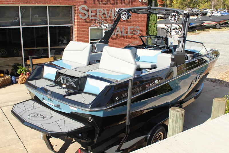 Slide: The Image of 2024 ATX Surf Boats 22 Type-S displayed at dealership, showcasing sleek design and modern features. - 15