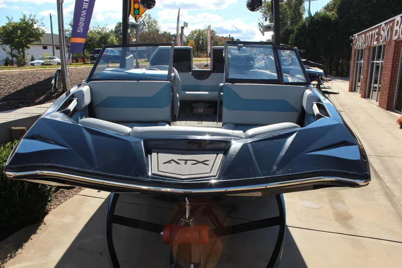 Slide: The Image of 2024 ATX Surf Boats 22 Type-S, sleek design, parked outdoors. - 18