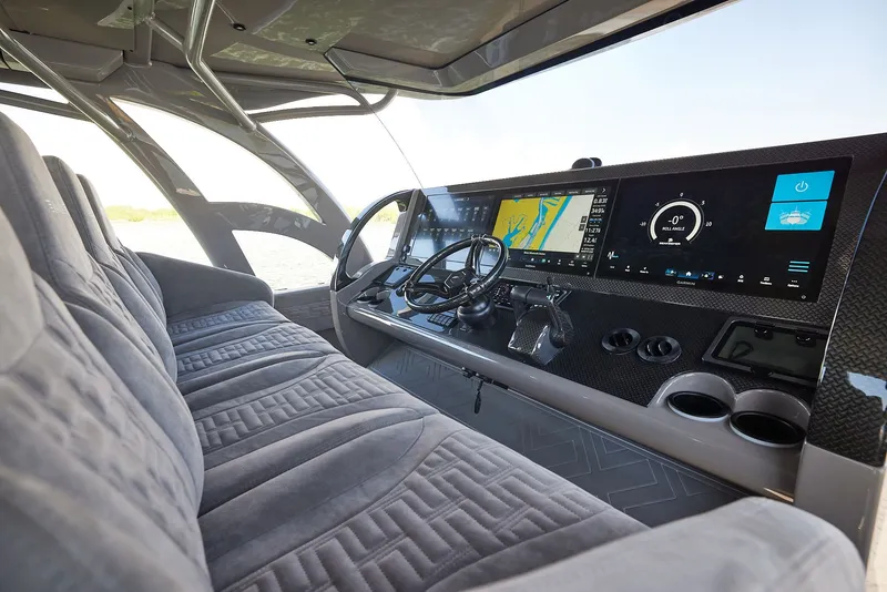 Slide: The Image of Interior of 2026 Midnight Express 52 Vitesse with modern control console. - 10