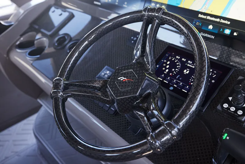 Slide: The Image of Steering console of the 2026 Midnight Express 52 Vitesse. - 12