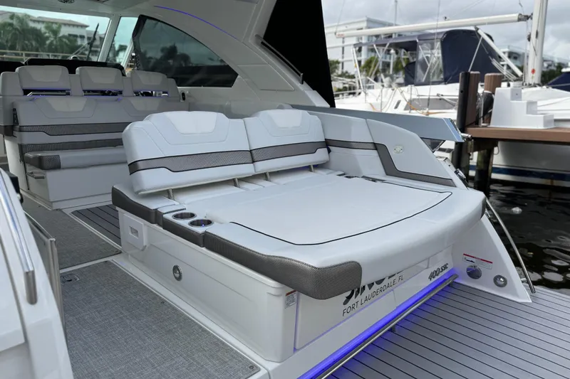 Slide: The Image of 2023 Formula 400 Super Sport Crossover luxury boat interior with plush seating. - 12