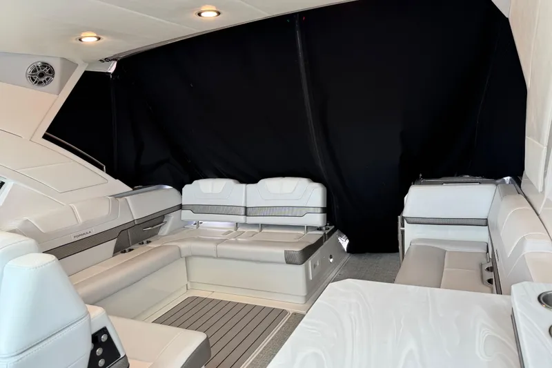Slide: The Image of Luxurious interior of 2023 Formula 400 Super Sport Crossover boat with elegant seating. - 15