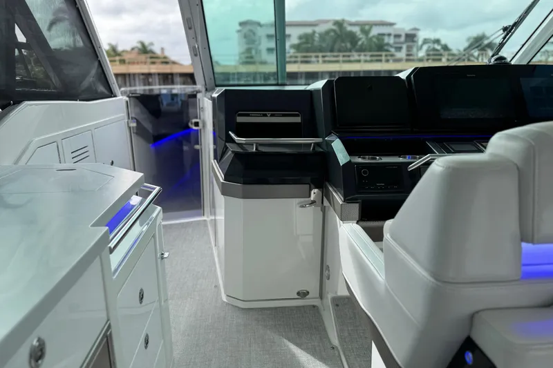 Slide: The Image of 2023 Formula 400 Super Sport Crossover interior with modern helm and seating. - 48