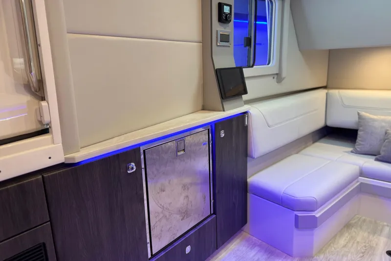 Slide: The Image of 2023 Formula 400 Super Sport Crossover interior with modern seating and ambient lighting. - 51