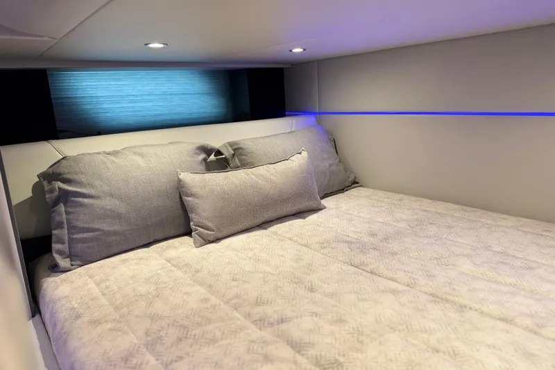 Slide: The Image of Luxurious cabin interior of 2023 Formula 400 Super Sport Crossover with plush bedding. - 56