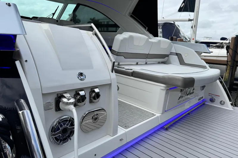 Slide: The Image of 2023 Formula 400 Super Sport Crossover yacht with sleek seating and modern design. - 6