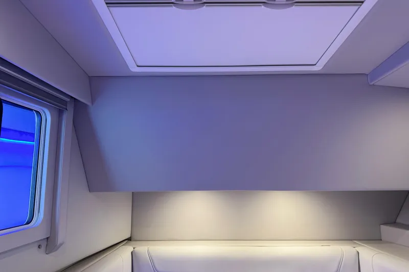 Slide: The Image of Interior of 2023 Formula 400 Super Sport Crossover, featuring sleek design and ambient lighting. - 64