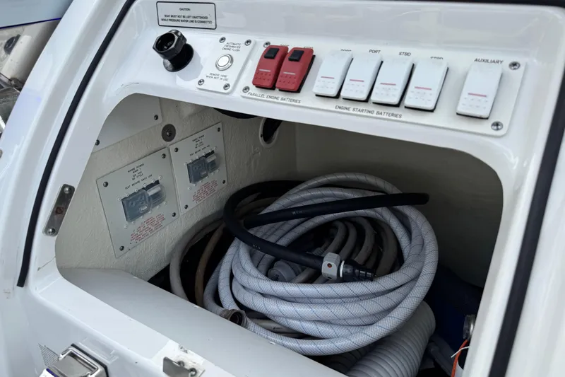 Slide: The Image of Control panel and storage compartment on 2023 Formula 400 Super Sport Crossover boat. - 7