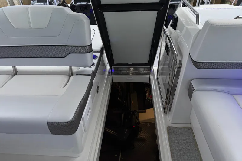 Slide: The Image of 2023 Formula 400 Super Sport Crossover interior seating and access hatch. - 72