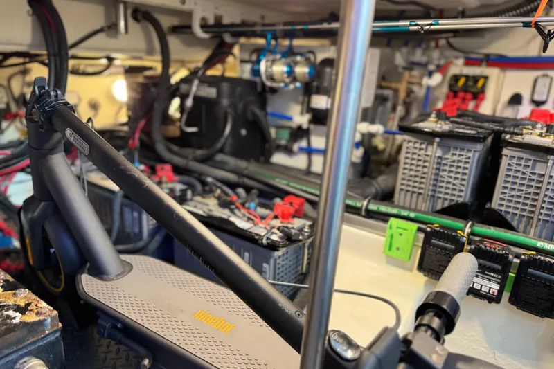 Slide: The Image of Engine room of 2023 Formula 400 Super Sport Crossover with Ninebot scooter. - 78