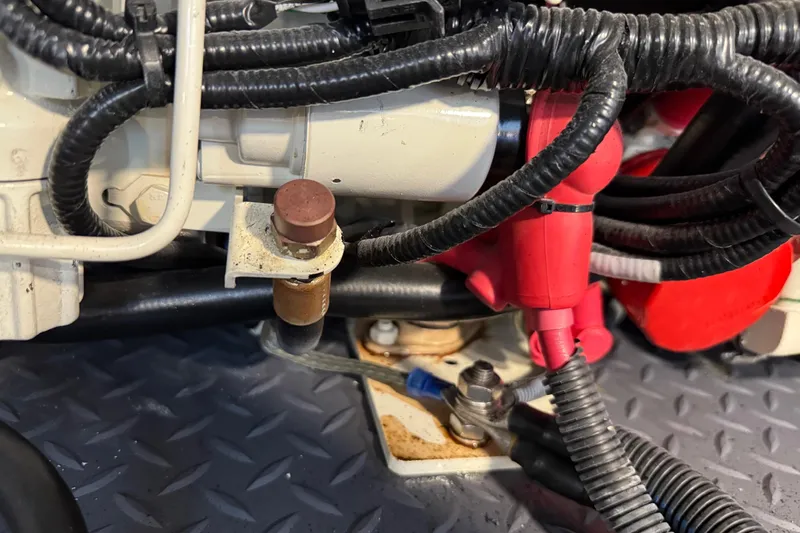 Slide: The Image of Close-up of 2023 Formula 400 Super Sport Crossover engine wiring and components. - 83