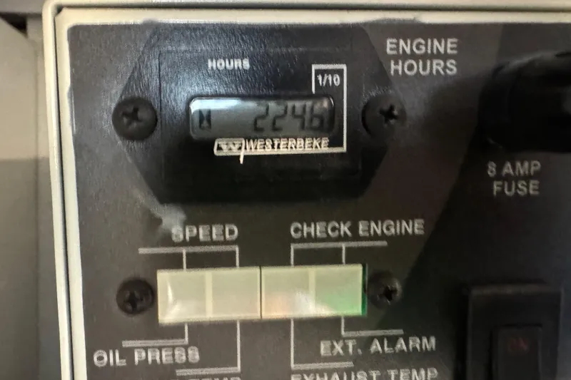 Slide: The Image of Control panel of 2023 Formula 400 Super Sport Crossover showing engine hours and indicators. - 85