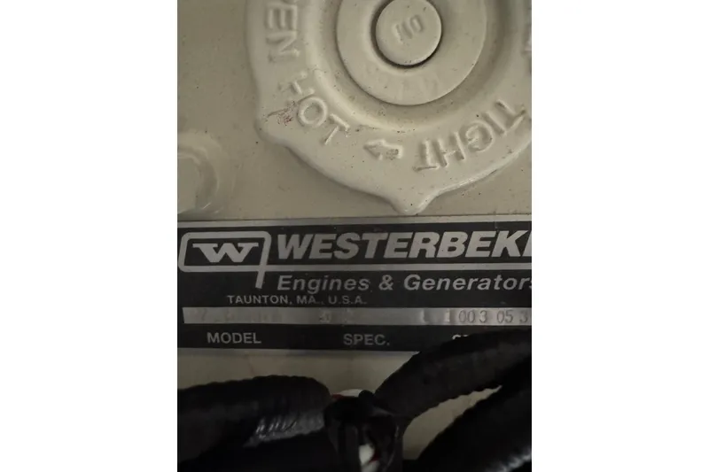 Slide: The Image of Close-up of Westerbeke engine label on 2023 Formula 400 Super Sport Crossover. - 87