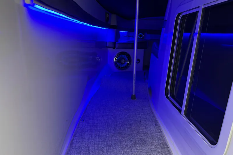 Slide: The Image of Interior of 2023 Formula 400 Super Sport Crossover with blue ambient lighting. - 89