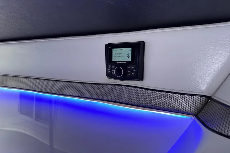 Slide: The Image of 2023 Formula 400 Super Sport Crossover interior with Bluetooth stereo and ambient lighting. - 96