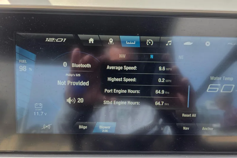 Slide: The Image of Dashboard of 2021 Yamaha Boats 252SE showing speed, engine hours, and fuel level. - 13