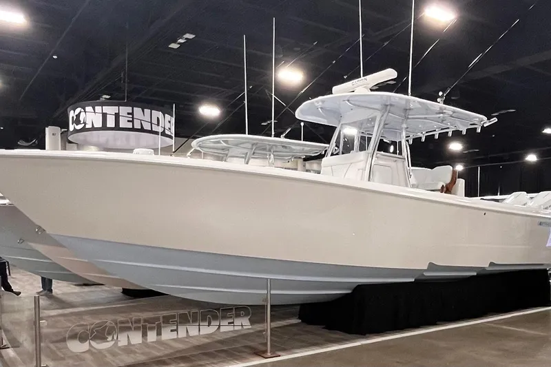 The Image of 2026 Contender 35 ST boat displayed at an indoor exhibition. - 0