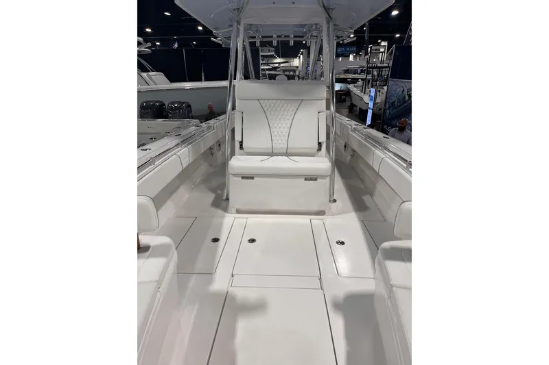 Slide: The Image of 2026 Contender 35 ST boat interior with white seating and sleek design. - 7