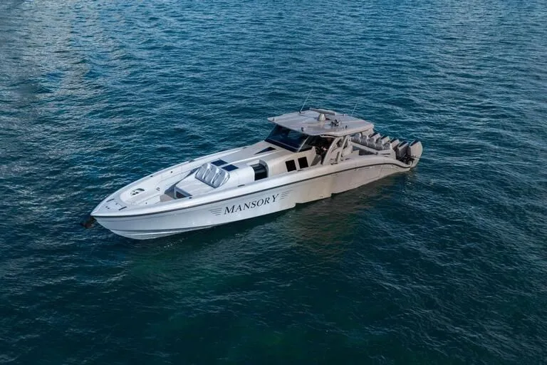 Slide: The Image of Luxurious 2026 Midnight Express 52' Vitesse yacht on open water, featuring sleek design and modern amenities. - 8